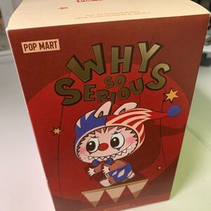 'Why So Serious' Red and Blue Toy